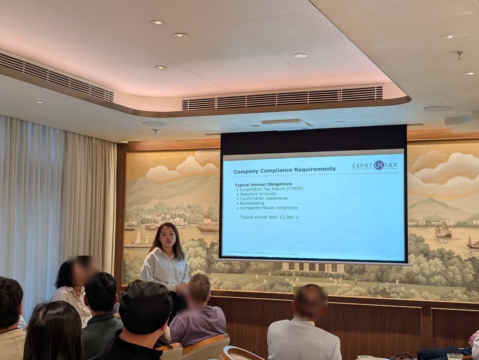 Amy Kwok presenting the annual compliance obligations for a UK company holding property, at the Hong Kong briefing